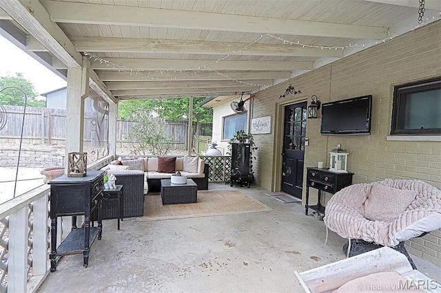 2754 Adeline Ave, Cape Girardeau, MO 63701 - fenced backyard with outdoor lounge area and a patio