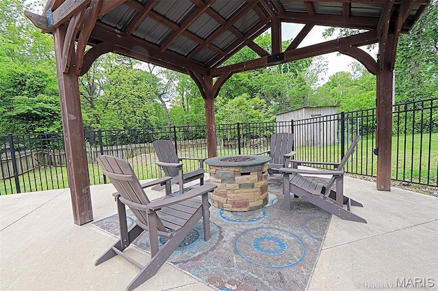2754 Adeline Ave, Cape Girardeau, MO 63701 - fenced backyard featuring an outdoor fire pit, a patio area, a shed, and a gazebo