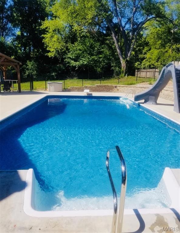2754 Adeline Ave, Cape Girardeau, MO 63701 - view of swimming pool featuring a water slide, a fenced backyard, and a gazebo