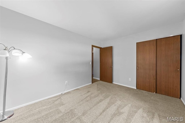 324 Trailview Ave, Saint Peters, MO 63376 - unfurnished bedroom featuring a closet, carpet, and baseboards