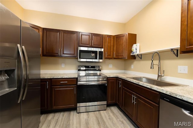 408 E Roosevelt, Salem, MO 65560 - kitchen featuring stainless steel appliances, a sink, and light countertops
