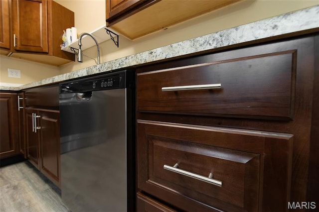 408 E Roosevelt, Salem, MO 65560 - kitchen featuring dishwasher, light countertops, and light wood-style floors