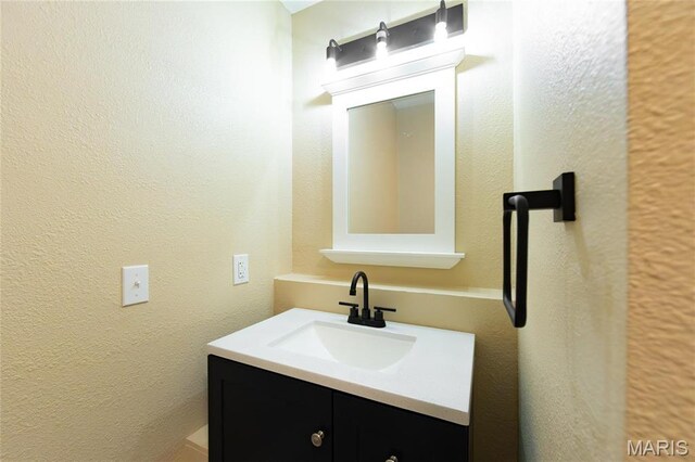408 E Roosevelt, Salem, MO 65560 - bathroom with vanity and a textured wall