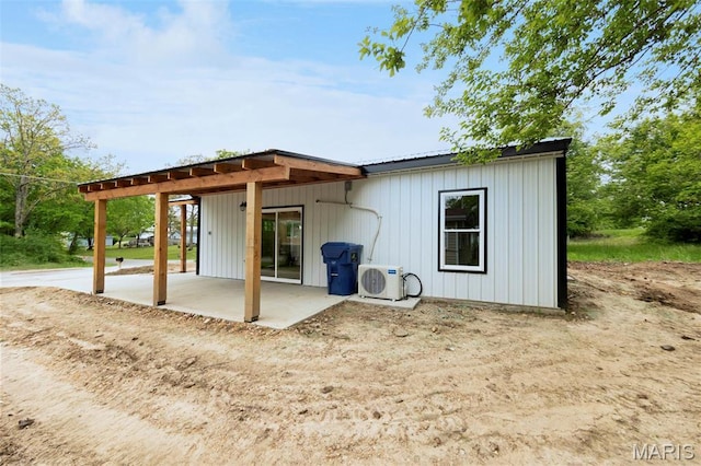408 E Roosevelt, Salem, MO 65560 - back of property with a patio and a cooling unit