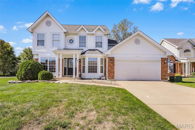 view of front facade featuring an attached garage, brick siding, concrete driveway, and a front lawn