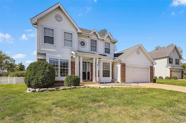 traditional-style home featuring brick siding, an attached garage, and concrete driveway