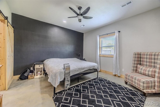 22950 Pin Oak Dr, Lebanon, MO 65536 - bedroom with a barn door, baseboards, ceiling fan, and concrete flooring