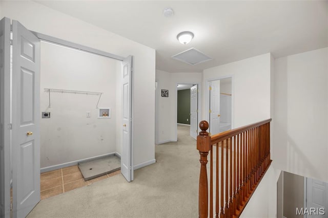 554 Springhurst Pkwy, Ofallon, MO 63368 - corridor with light carpet, an upstairs landing, baseboards, and attic access