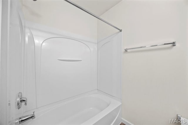 554 Springhurst Pkwy, Ofallon, MO 63368 - bathroom with  shower combination and baseboards