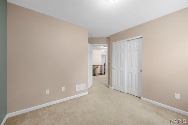 554 Springhurst Pkwy, Ofallon, MO 63368 - unfurnished bedroom featuring carpet floors, baseboards, and a closet
