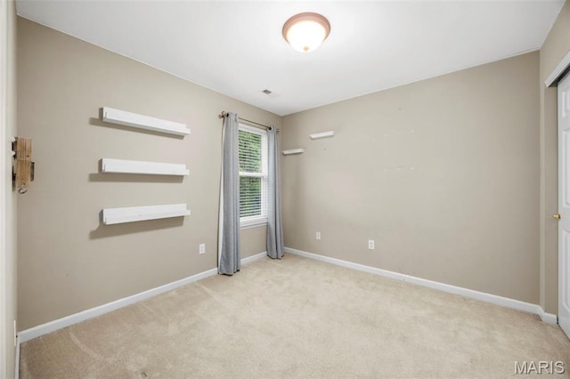 554 Springhurst Pkwy, Ofallon, MO 63368 - carpeted spare room featuring baseboards