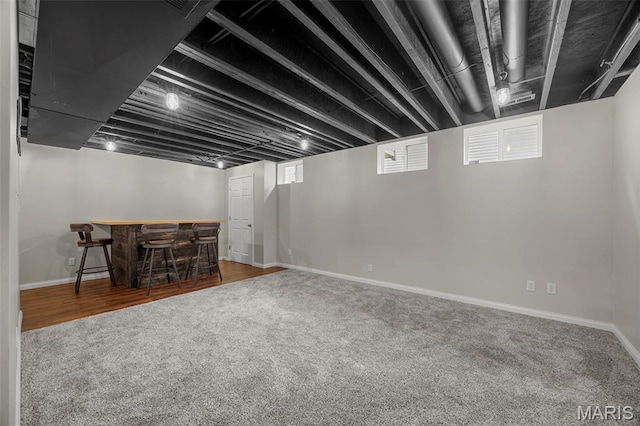 554 Springhurst Pkwy, Ofallon, MO 63368 - basement featuring carpet flooring, a dry bar, and baseboards