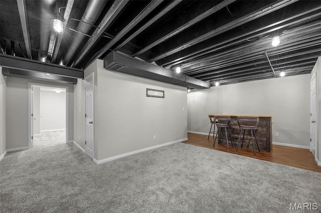 554 Springhurst Pkwy, Ofallon, MO 63368 - finished basement featuring a dry bar, carpet, and baseboards
