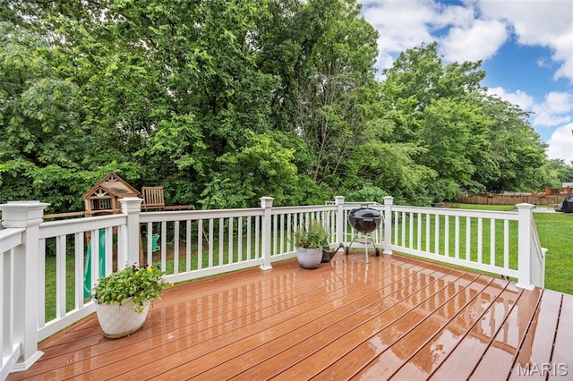 554 Springhurst Pkwy, Ofallon, MO 63368 - wooden deck featuring a lawn and a playground