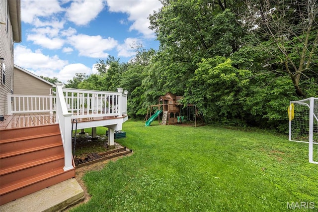 554 Springhurst Pkwy, Ofallon, MO 63368 - view of grassy yard with a playground and a wooden deck