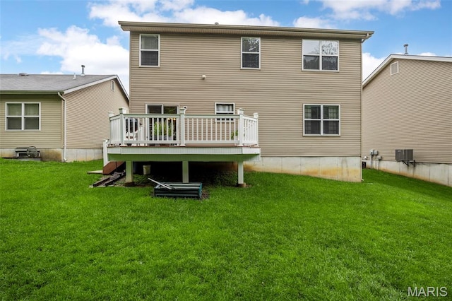 554 Springhurst Pkwy, Ofallon, MO 63368 - rear view of property with a deck, a yard, and central AC