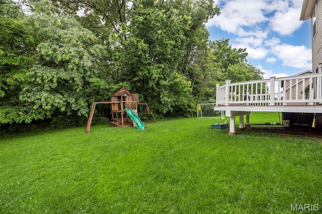 554 Springhurst Pkwy, Ofallon, MO 63368 - view of grassy yard with a playground and a deck