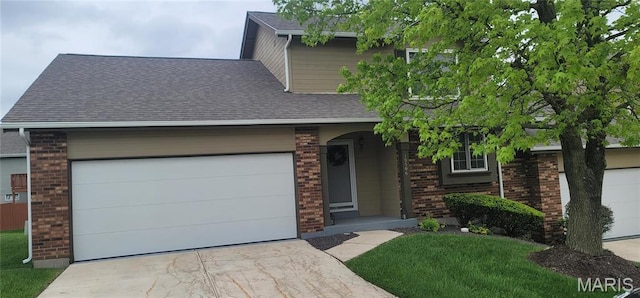 10506 Camden Park Dr, Saint Louis, MO 63135 - view of front of home featuring brick siding, driveway, a shingled roof, and an attached garage