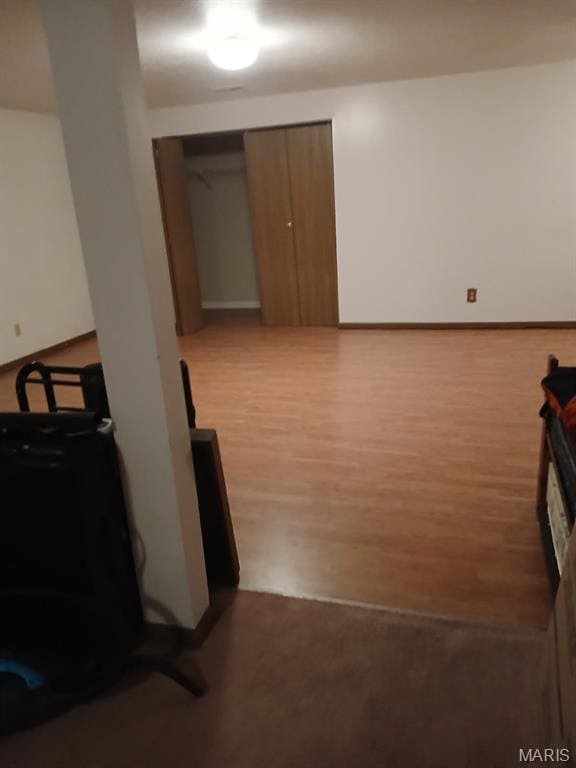 10506 Camden Park Dr, Saint Louis, MO 63135 - corridor with wood finished floors and baseboards