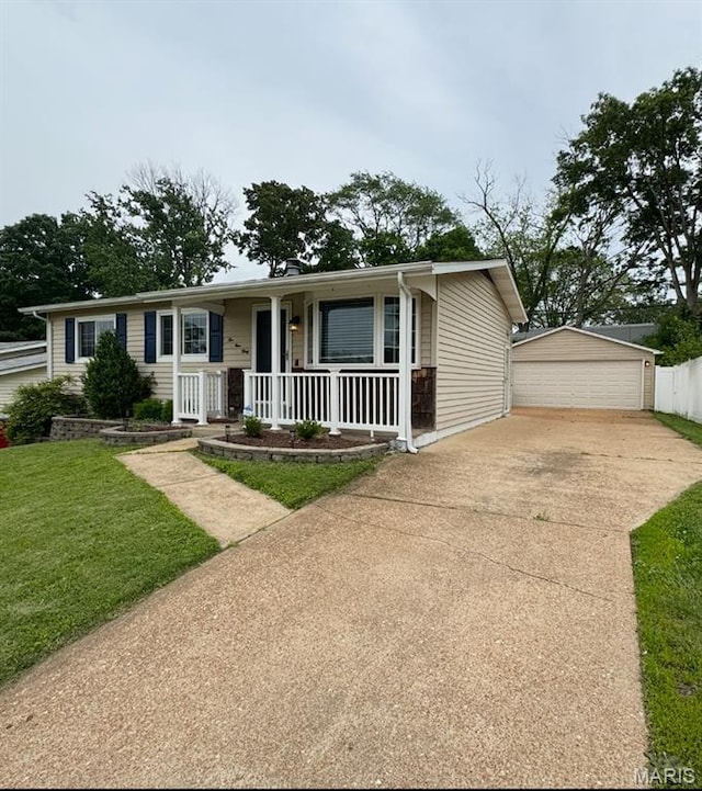 ranch-style house with a porch, a detached garage, an outdoor structure, and a front yard