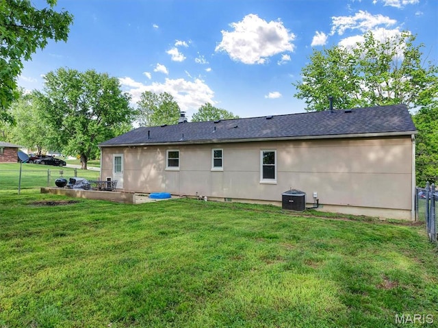 1101 Sunset Dr, Sullivan, MO 63080 - back of house with central AC, a shingled roof, and a patio area