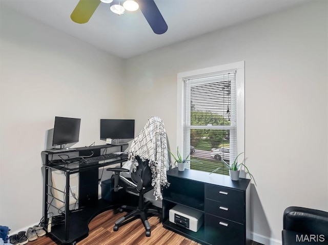 1101 Sunset Dr, Sullivan, MO 63080 - home office with a ceiling fan, wood finished floors, and baseboards