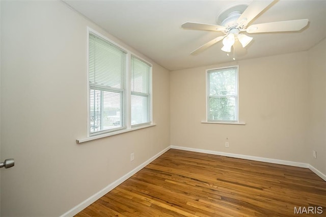 126 E Waymire Ave, Saint Louis, MO 63119 - spare room with baseboards, wood finished floors, and a ceiling fan