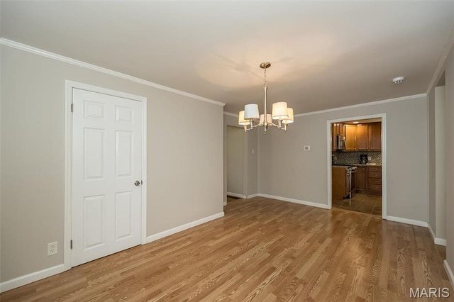 126 E Waymire Ave, Saint Louis, MO 63119 - unfurnished dining area with a chandelier, light wood-style floors, baseboards, and ornamental molding