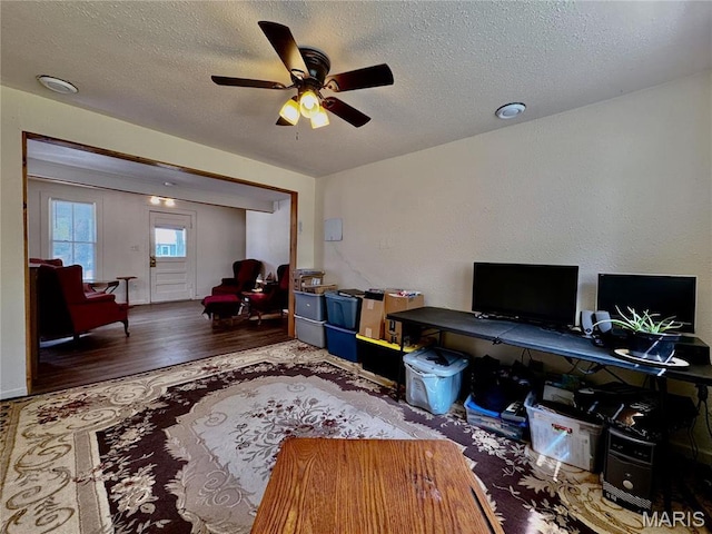 274 Cornelison St, Lebanon, MO 65536 - office area with a textured ceiling, ceiling fan, and wood finished floors