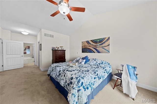 bedroom with carpet flooring, lofted ceiling, baseboards, and ceiling fan