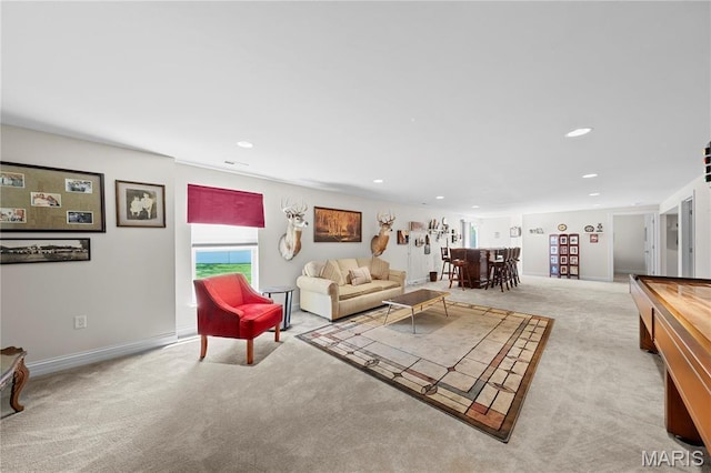 living room featuring carpet, recessed lighting, and baseboards