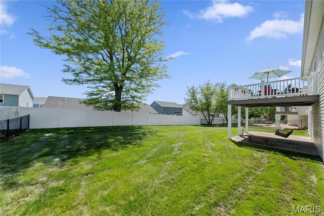view of yard with a deck