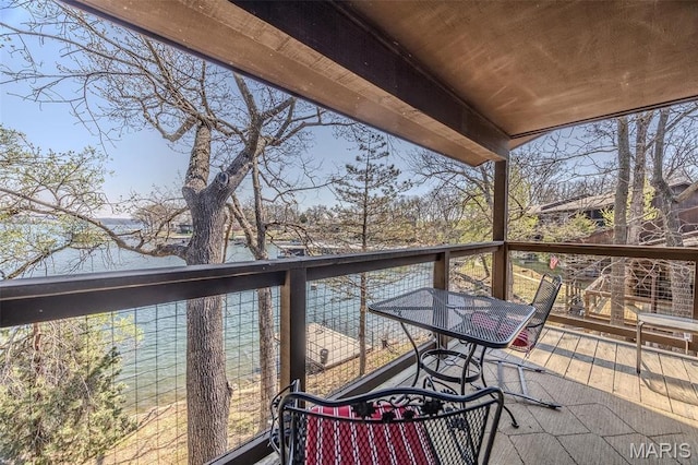 256 Lone Oak Unit 15, Sunrise Beach, MO 65079 - wooden terrace featuring outdoor dining area