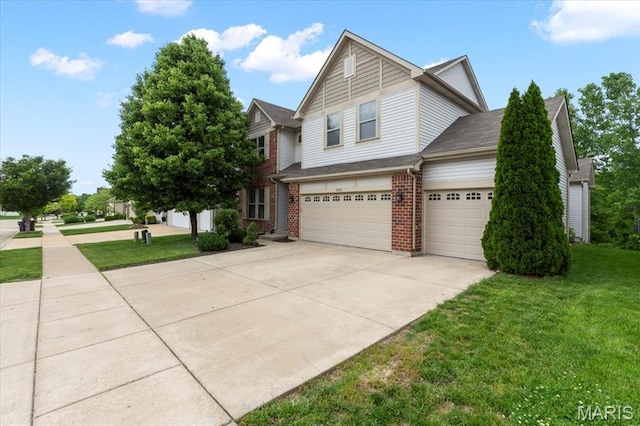 2226 Bay Tree Dr, Saint Peters, MO 63376 - traditional home featuring brick siding, a front lawn, concrete driveway, and an attached garage