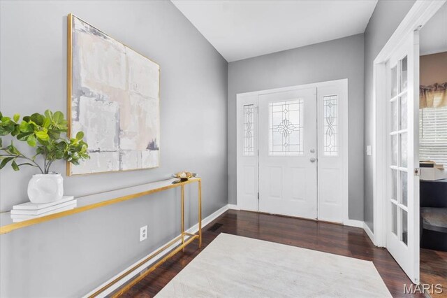 2226 Bay Tree Dr, Saint Peters, MO 63376 - entryway with wood finished floors, baseboards, and french doors
