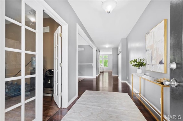 2226 Bay Tree Dr, Saint Peters, MO 63376 - entrance foyer featuring french doors, wood finished floors, and baseboards