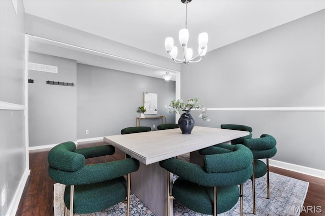 2226 Bay Tree Dr, Saint Peters, MO 63376 - dining space with baseboards, a chandelier, and wood finished floors