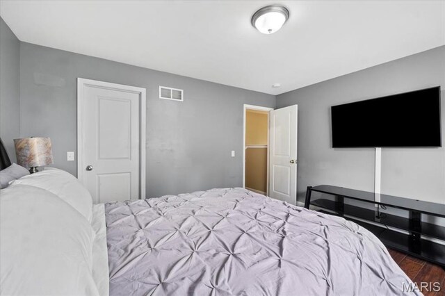 2226 Bay Tree Dr, Saint Peters, MO 63376 - bedroom with dark wood finished floors and a closet