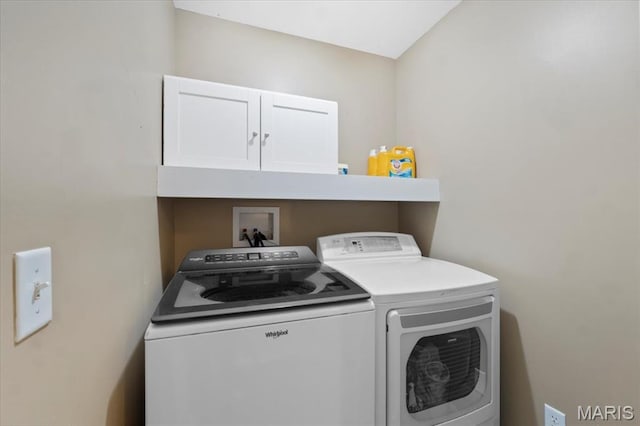 2226 Bay Tree Dr, Saint Peters, MO 63376 - washroom featuring cabinet space and independent washer and dryer