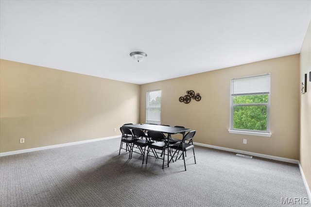 2226 Bay Tree Dr, Saint Peters, MO 63376 - carpeted dining room with baseboards