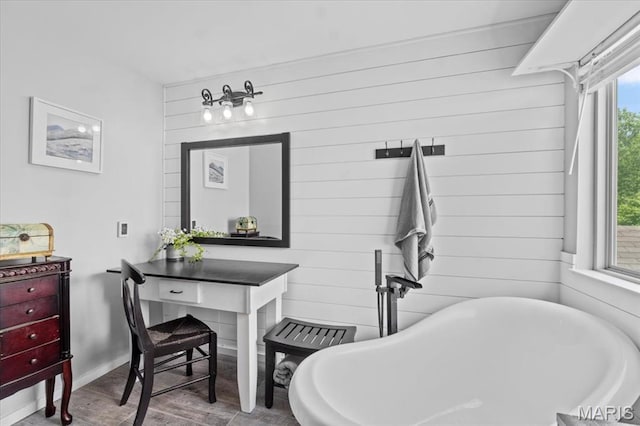 2226 Bay Tree Dr, Saint Peters, MO 63376 - full bathroom with a freestanding tub, wood finished floors, wood walls, and baseboards