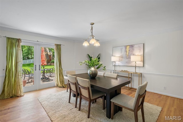 2125 Crystal Dr, Saint Louis, MO 63131 - dining area with french doors and light wood-style flooring
