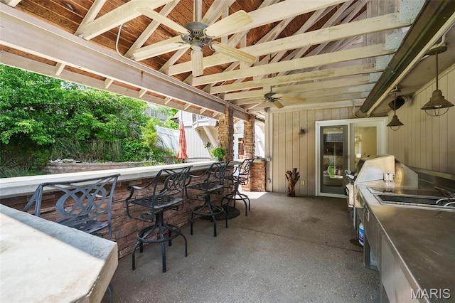 2125 Crystal Dr, Saint Louis, MO 63131 - view of patio featuring a ceiling fan and an outdoor kitchen
