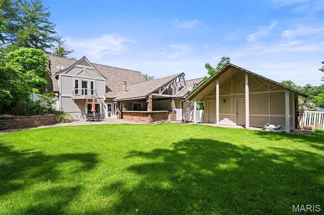 2125 Crystal Dr, Saint Louis, MO 63131 - back of house featuring a patio area, roof with shingles, and cooling unit