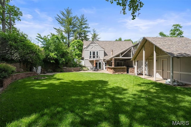 2125 Crystal Dr, Saint Louis, MO 63131 - rear view of property with a lawn, a balcony, and roof with shingles