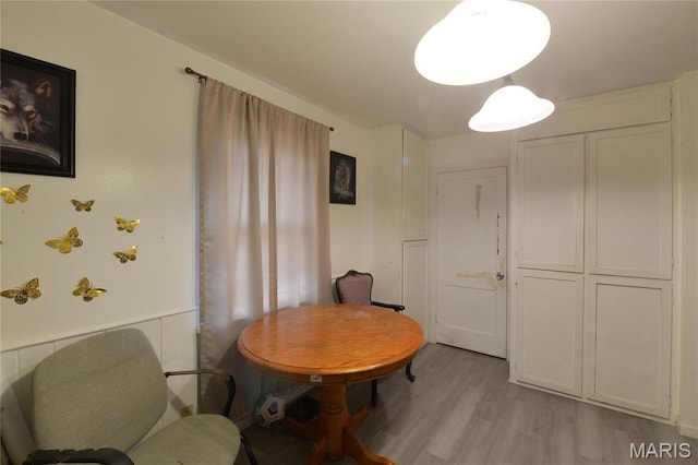dining area featuring light wood-type flooring