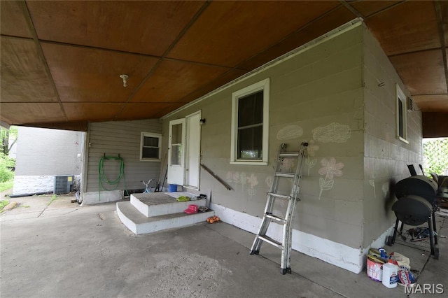 view of patio with central AC unit