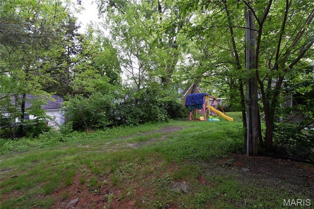 view of yard featuring a playground