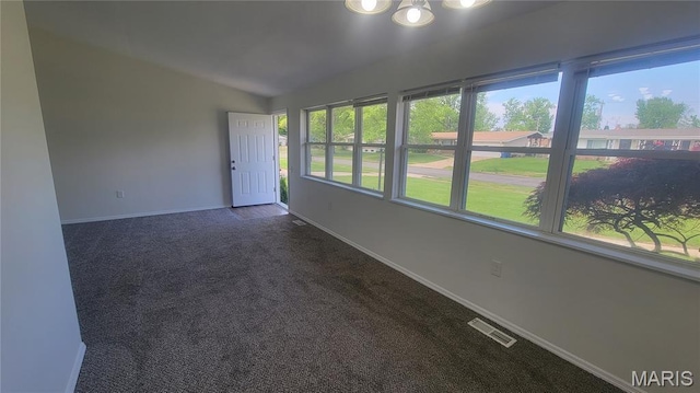 2490 Northridge Pl, Florissant, MO 63033 - unfurnished sunroom with vaulted ceiling and a chandelier