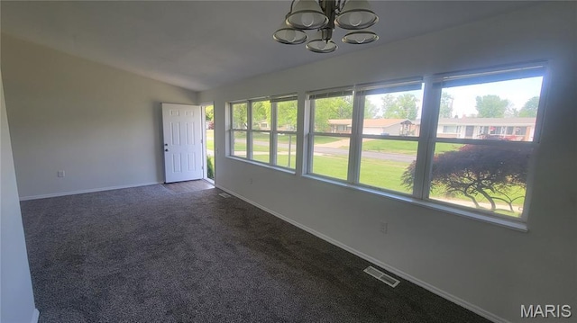 2490 Northridge Pl, Florissant, MO 63033 - unfurnished sunroom featuring lofted ceiling, a chandelier, and plenty of natural light